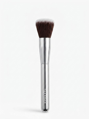 A single makeup brush with dark brown bristles, a silver ferrule, and a polished silver handle, standing upright on a clean white background. The brand name 'conside' is printed vertically on the handle.